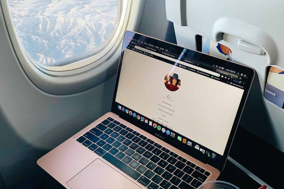 Laptop on airplane travelling.