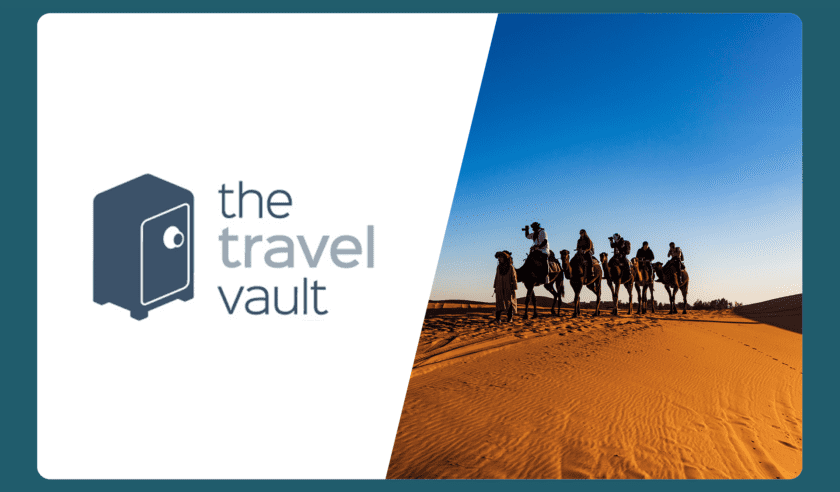 Image of The Travel Vault logo and dessert with camels riding over sand dune