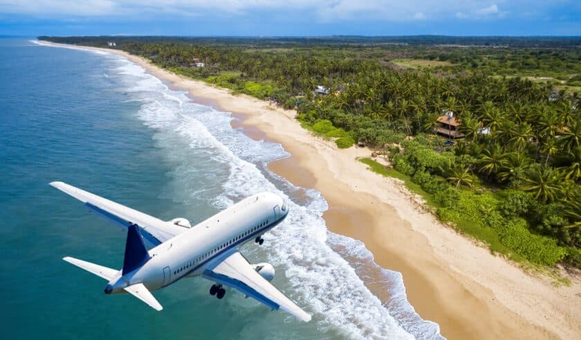 Plane over luxury island